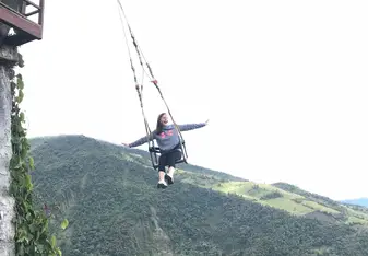 Swing on the edge of the world in Baños, Ecuador