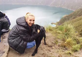 My pooch friend Valeria and I in front of La Laguna de Quilotoa