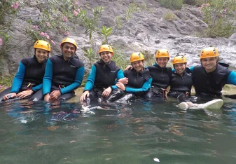 Very cool activity in the mountains including a hike, slides down rocks, repelling, and jumping off rocks