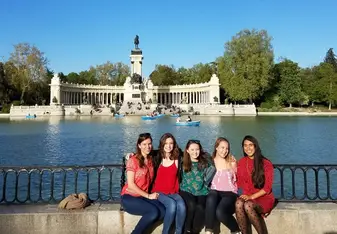 A group of women at a popular tourist spot.