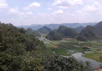 This amazing overlook can be seen from the top of Qinglong mountain in the scenic town Puzhehei. Located several hours from Kunming, Puzhehei is conveniently reachable by high-speed rail.