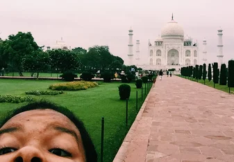 My posing in front of the Taj Mahal 