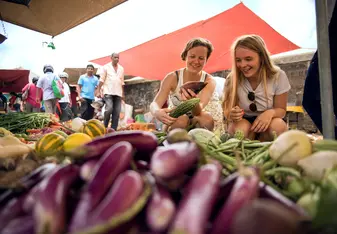 two girls at a local market