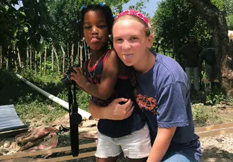 Many kids liked to hang around the construction site and always wanted to help us out. 