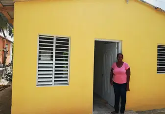 Our last service day in Monte Coca. The house was completely finished. Olgalidia was the woman who received the house. 