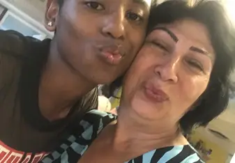 This is a picture of my host mother, Vaje and myself.