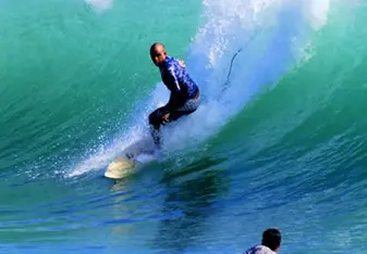 person surfing catching a big wave