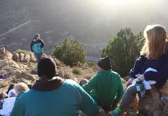 A group of people at the mountains.