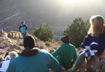 A group of people at the mountains.