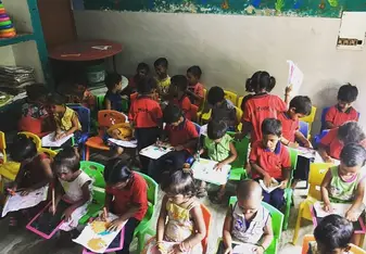 Children inside a classroom.