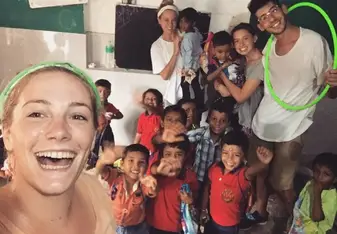 Volunteers take a groufie with the school children.