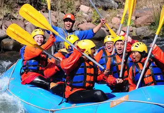 People white water rafting.