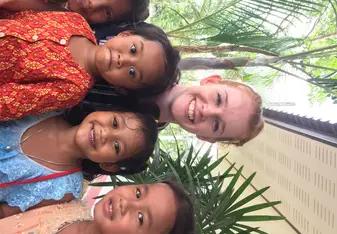Nicole with the kinder kids