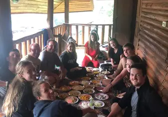 A group of people dining together.