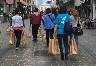 Handing out care bags 
