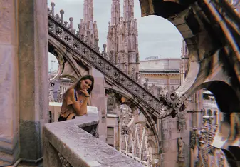 On top of the Duomo di Milano overlooking the city.