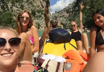 Group of persons boating.