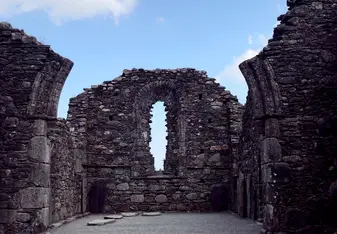 The Seven Churches of Glendalough in County Wicklow. This is a photo of the Cathedral nested in the monastic city, inside a small cupboard was built to house treasured vessel and other materials used for mass.