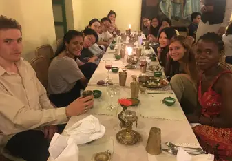 Dining a traditional nepalese meal, with some of the volunteers in Kathmandu.