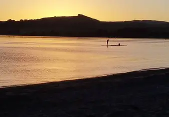 Stopped our road trip for a minute to watch this amazing sunset during our trek across New Zealand.