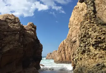 picturesque scenery made by the rocks and ocean