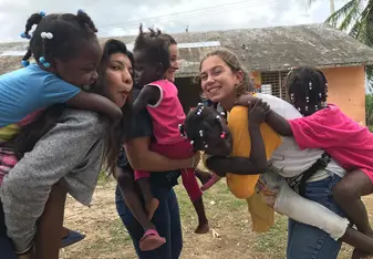 Playing with children at health clinics