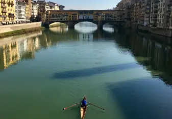 A photo of a kayak under the Ponte Vecchio 