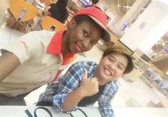 With my workmate as I was working as a cashier in Dubai