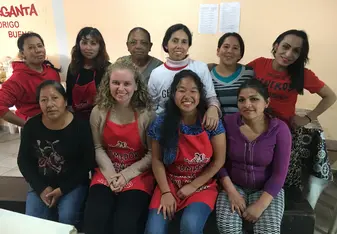  The group of mothers working in the kitchen