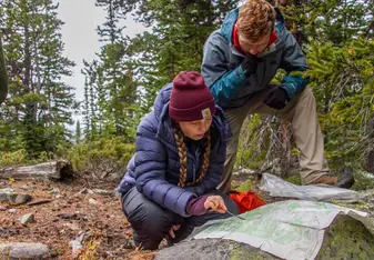 I and a fellow HMI Gap student, as co-leaders of the day, use our skills of navigation to lead the group to our campsite for the day.