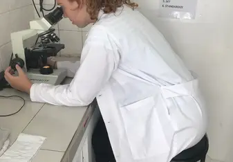 This is me helping to analyze blood and urine samples at the clinic, where I volunteered five days a week.