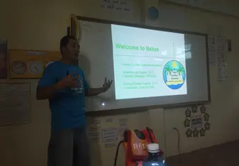 meeting an on-site teacher for the students on caye caulker