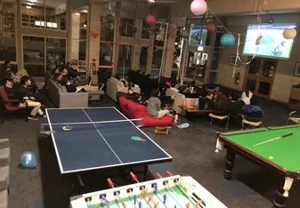 Watching the rugby game with a bunch of friends from RMC, a college on campus. 