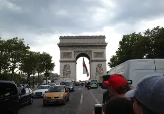The day after the world cup we went to the Champs-Élysées and saw this massive flag hanging from the arc de Triomphe.