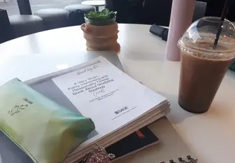At library cafe with iced mocha