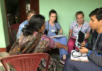 This is a clinic group with 3 students, the patient, doctor, and translator. 