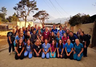 This is our whole group after the first day of clinic we had. This includes our medical and dental team. 
