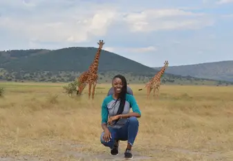 10 Ways to Study Abroad: Young Woman in Africa with Giraffes