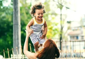 Interesting Au Pair Destinations - Woman playing with child
