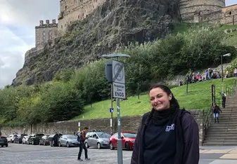 Me standing in front of the Edinburgh castle.