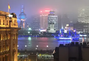 Hazy view of the Pearl Tower from the Bund