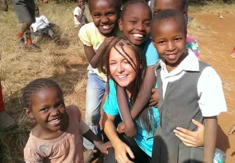 a volunteer working with kids