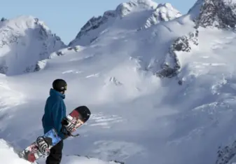 Snowboarding in the mountains