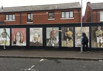 Murals on one of the peace walls in Belfast