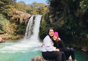 Francesca and Charlotte at a waterfall