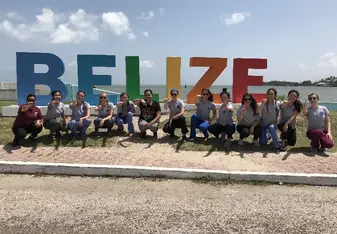 The infamous Belize sign that every group takes photos in front of
