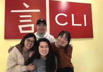 This is a photo of my three teachers and me