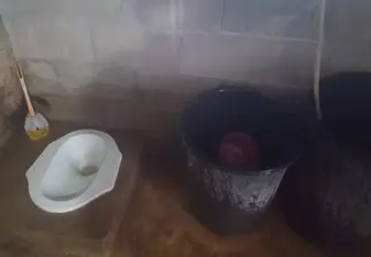 Typical bathroom situation (yes, that's a squat toilet) 