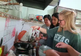 learning how to make Pad Thai with the host fam & their friends!