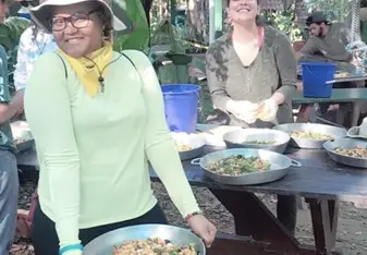 Preparing food for the beautiful macaws